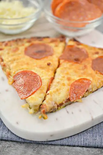 Keto Zucchini Crust Pizza Recipe + Image by Kimspired DIY