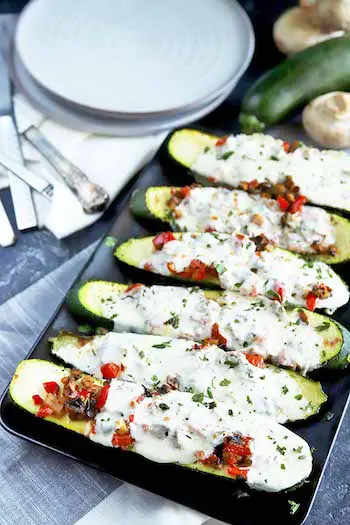 Zucchini Mushroom Pepper Boats with Mozzarella Recipe + Photo via FOODAL.COM