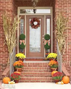 Classic Fall-Colored Mums and Pumpkins Porch Display
